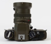 LEITZ Portugal: Leica R3 Electronic Safari [#1469842], 1978, fitted with Summilux-R f4 50mm lens [#2806895]. Together with a Leitz 12508 lens hood and an additional Elmarit-R f2.8 28mm lens [#2876165] with rear cap and hood. Original Leitz certificate for - 4
