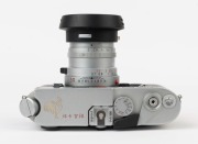 LEITZ: Leica Model M6 Year of the Rooster 1993 [#1929147],  #147 of 268 manufactured, fitted with silver finish Sumircron-M f2 50mm lens with matching serial number [#147/300]. The top of the camera body engraved with a golden rooster plus the phrase in C - 5