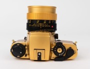 LEITZ: Leica R4 Gold [#1651925] pale brown snakeskin body cover and C157 number plate affixed on rear of body, 1984, with a gold and black special edition Summilux-R f4 50mm lens [#3295897]. Original felt-lined presentation timber case, box, paperwork and - 4