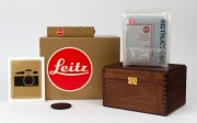 LEITZ: Leica R4 Gold [#1651925] pale brown snakeskin body cover and C157 number plate affixed on rear of body, 1984, with a gold and black special edition Summilux-R f4 50mm lens [#3295897]. Original felt-lined presentation timber case, box, paperwork and - 6