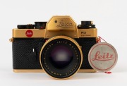 LEITZ: Leica Model R3 Gold [#1523989] black lizard skin covering, issued in 1979 to commemorate The 100th Anniversary of Oskar Barnack's birth with a facsimile&nbsp;of his signature and the dates engraved on top of the prism housing. Fitted with matching gold - 2