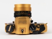 LEITZ: Leica Model R3 Gold [#1523989] black lizard skin covering, issued in 1979 to commemorate The 100th Anniversary of Oskar Barnack's birth with a facsimile&nbsp;of his signature and the dates engraved on top of the prism housing. Fitted with matching gold - 4