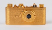 LEITZ: Leica Model I 24 Carat Gold Plated Miniature Replica [#1010], 1993, with original box and Certificate of Authenticity. - 2