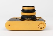 LEITZ Canada: Leica M4-2 Gold Plated Special Edition [#1528598], 1979, limited edition of 1000 to commemorate the birth of Oskar Barnack, with black and gold plate Summilux f4 50mm lens [#2980853]. The camera numbered 100-0573 on top plate. Original box i - 5