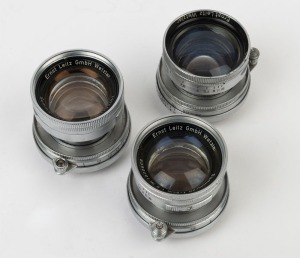 LEITZ: A group of 50mm f2 lenses comprising Summitar [#705718], Summicron [#1020609] and Summicron [#1253401], (3 items); mixed condition