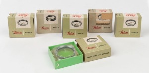 LEITZ: Group of filters comprising HOOKI blue chrome, FIOLA UV chrome, POOTR polariser, XQIOO polariser, HOOFG green and HOOIV UVA. All in original boxes. (6 items)
