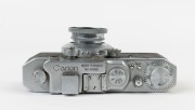 CANON NS rangefinder camera [#10880], 1941-42, with Nikkor 50mm f3.5 lens [#501380] in shutter #1917; pop up rangefinder; Canon Seiki-Kogaku&nbsp;engraved on top plate. With Canon ERC with straps. [NB: While the vulcanite body covering has deteriorated [see pi - 4