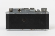 Canon Model J-II camera [#8569] engraved Canon Seiki-Kogaku&nbsp;on top plate, 1945-46, with Serenar&nbsp;50mm f3.5 lens [#8050] and metal cap. - 3