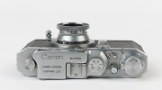Canon 'Canon Camera Company Ltd' S-II rangefinder camera [#18382], 1947-48, with Serenar 50mm f3.5 lens [#10004]; the bottom plate engraved "Made in Occupied Japan". - 4