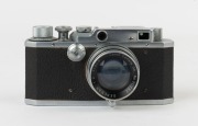 Canon 'Canon Camera Company Ltd' S-II rangefinder camera [#18712], 1947-48, with Serenar 50mm f2 lens [#20382] with metal cap; the bottom plate engraved "Made in Occupied Japan". - 2