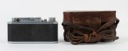 Canon 'Canon Camera Company Ltd' S-II rangefinder camera [#22841], 1947-48, with Serenar 50mm f2 lens [#21545]; the bottom plate engraved "Made in Occupied Japan". With Canon leather ERC with straps. - 3