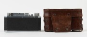 Canon 'Canon Camera Company Ltd' S-II rangefinder camera [#22991], 1947-48, with Serenar 50mm f1.9 lens [#22477]; the bottom plate engraved "Made in Occupied Japan". With Canon leather ERC with straps. - 3