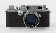 Canon 'Canon Camera Company Ltd' 11B&nbsp;rangefinder camera [#38035], 1950, with Nikkor-HC&nbsp;50mm f2 lens [#628932] with metal cap; the bottom plate engraved "Made in Occupied Japan". - 2