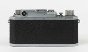 Canon 'Canon Camera Company Ltd' 11B&nbsp;rangefinder camera [#38035], 1950, with Nikkor-HC&nbsp;50mm f2 lens [#628932] with metal cap; the bottom plate engraved "Made in Occupied Japan". - 3