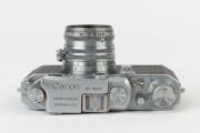Canon 'Canon Camera Company Ltd' 11B&nbsp;rangefinder camera [#38035], 1950, with Nikkor-HC&nbsp;50mm f2 lens [#628932] with metal cap; the bottom plate engraved "Made in Occupied Japan". - 4