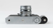Canon Model IIS&nbsp;rangefinder camera, 1954-55 [#113277; model identified on loading diagram] with Canon f1.8 50mm lens [#105802] and self-extension adaptor; metal lens cap also present. - 5