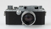 Canon rangefinder camera Model IID2, 1956 [#220586] with Canon f1.8 50mm lens [163102] and Lyon flash attachment. - 2