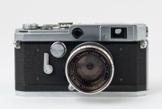 Canon rangefinder camera Model VL, 1958 [#566360] with Canon 50mm F1.8 lens [#227111]. - 2
