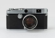 Canon rangefinder camera Model L-1 <E.P> 1957 [#563025], with Canon 50mm f1.8 lens [#228002]. - 2