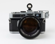 Canon Model 7 rangefinder camera, 1961 [#938125] with Canon 50mm f0.95 lens [#21939], Canon Accessory Coupler and Canon 50 optical viewfinder; the lens additionally with UV 1x filter and lens hood. - 2