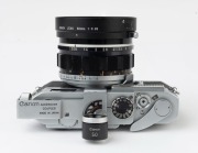 Canon Model 7 rangefinder camera, 1961 [#938125] with Canon 50mm f0.95 lens [#21939], Canon Accessory Coupler and Canon 50 optical viewfinder; the lens additionally with UV 1x filter and lens hood. - 4
