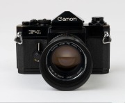 Canon F-1 SLR camera, 1971 [#201504] with Canon FD 50mm f1.4 lens [#153951], lens hood and extension ring. - 2