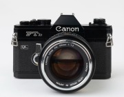 Canon FTb QL SLR camera, 1971 [#237333, black body], with Canon FD 55mm f1.2 lens [#11987]. - 2