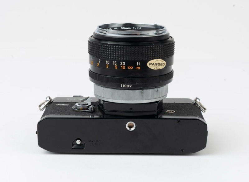 Canon FTb QL SLR camera, 1971 [237333, black body], with Canon FD 55mm