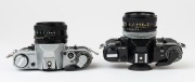 Canon AE-1 SLR cameras: one with black finish [#911428] and Canon FD 50mm f1.8 S.C. lens [#624787] and original box; the other with chrome finish [#1689930] with Canon FD 50mm f2 lens [#78999]. (2 cameras). - 4