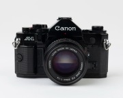Canon A-1 SLR camera,1979 [#1952746] with Canon FD 50mm f1.4 lens [#3466358] and commemorative lens cap "OFFICIAL CAMERA OF THE FOOTBALL WORLD CUP 1982". - 3