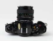 Canon A-1 SLR camera,1979 [#1952746] with Canon FD 50mm f1.4 lens [#3466358] and commemorative lens cap "OFFICIAL CAMERA OF THE FOOTBALL WORLD CUP 1982". - 5