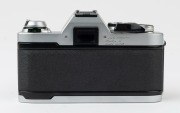 Canon AL-1 QF SLR camera, 1982 [#1097585] with Canon FD 50mm f1.8 lens [#5980840], the commemorative lens cap "OFFICIAL 35MM CAMERA * 1984 OLYMPIC GAMES". - 3