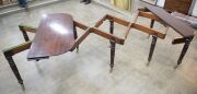 GILLOWS Georgian mahogany extension dining table with fold-over top and concertina undercarriage, eight turned and tapered gun barrel legs with original brass castors, accompanied by mahogany extension leaf holder and four extension leaves, circa 1810, 75 - 3