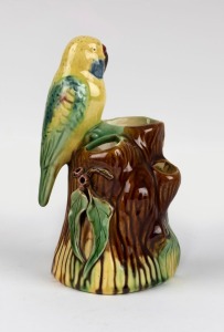 A ceramic parrot vase, circa 1930, ​17.5cm high