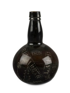An antique glass bottle with folk art inscription "ELIZABETH LAIRD, 1841" with thistle and rose decoration. Laird was convicted in Edinburgh in 1839 and sentenced to 7 years transportation. 17cm high