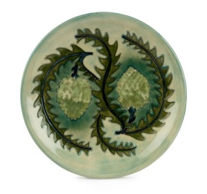 MOORCROFT "Banksia" pattern plate, Impressed "Moorcroft, Made In England", with "W.M." monogram, ​​​​​​​26cm diameter