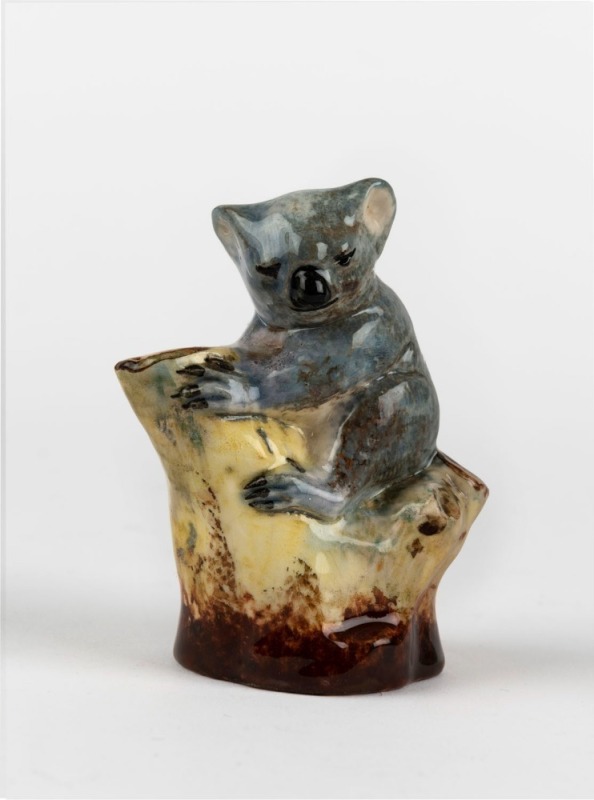 NEWTONE POTTERY koala tree stump statue BY DAISY MERTON, stamped "Hand Painted", 9cm high