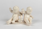 MARTIN BOYD pottery figural group of cherubs, incised "Martin Boyd, Australia", ​​​​​​​8cm high, 13cm wide