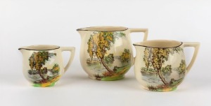 EMPIRE "Wattle Time" graduated set of three English porcelain jugs, factory marks to bases, ​​​​​​​the largest 12cm high