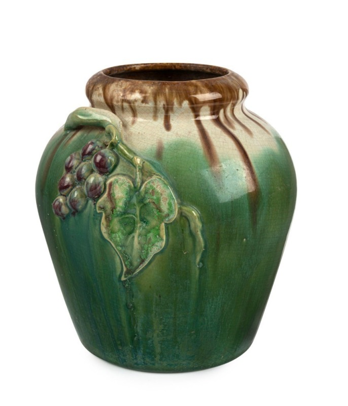 REMUED green glazed pottery vase with applied grapes and leaves, incised "Remued Hand Made 42LM", 21.5cm high, 19cm wide