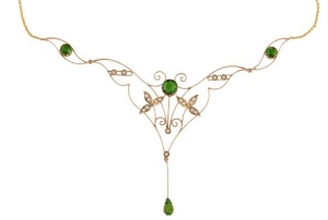 A stunning Belle Époque Edwardian gold necklace set with tourmaline and seed pearls, circa 1900,the pendant section and impressive 10cm high by 10cm wide
