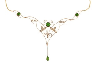 A stunning Belle Époque Edwardian gold necklace set with tourmaline and seed pearls, circa 1900,the pendant section and impressive 10cm high by 10cm wide