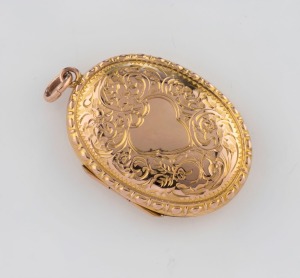 An antique 9ct yellow gold fob locket with engraved decoration, circa 1900, 3.5cm high, 6.5 grams total