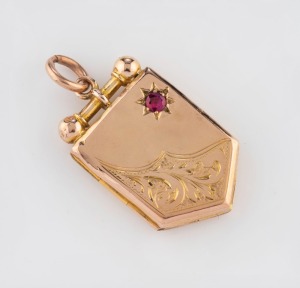 JOHNSON & SIMONSEN of Melbourne, 9ct gold locket set with red stone, circa 1910, 3.5cm high overall, 5.4 grams total