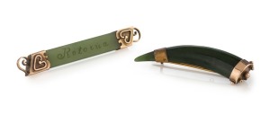 Two antique New Zealand greenstone brooches with gold mounts, 19th century, ​​​​​​​6.5cm and 5.5cm long