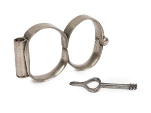 PLUG 8 nickel plated handcuffs, numbered "0", with key and original plug, 13.5cm wide