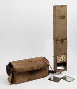 WWI TRENCH PERISCOPE: Trench periscope with original label identifying it as 'Periscope No.9, Mark II" made by Adam & Co (Great Britain, 1918), two spare mirrors, housed in canvas bag, 36cm high.