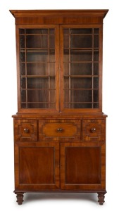 An early and important Colonial Australian secretaire bookcase, cedar and beefwood with pine secondary timbers, Hobart origin, circa 1825, 253cm high, 124cm wide, 57cm deep Provenance: The Barclay family, by descent, 'Hendrewen', 326 Macquarie St, Hobart. Private Collection.