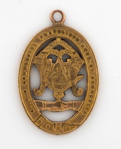 "UNITED COMMERCIAL TRAVELLERS ASSOCIATION OF AUSTRALIA" 9ct yellow gold fob engraved to "J.J. WILSON, 25/2/55", stamped "STOKES, 9ct", 5cm, 6.5 grams