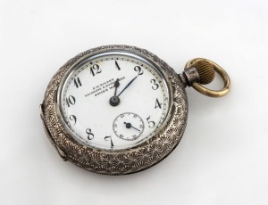 An antique silver cased lady's pocket watch, enamel dial marked "F.W. NISSEN, BRISBANE & BUNDABERG", late 19th century, 4.5cm wide overall